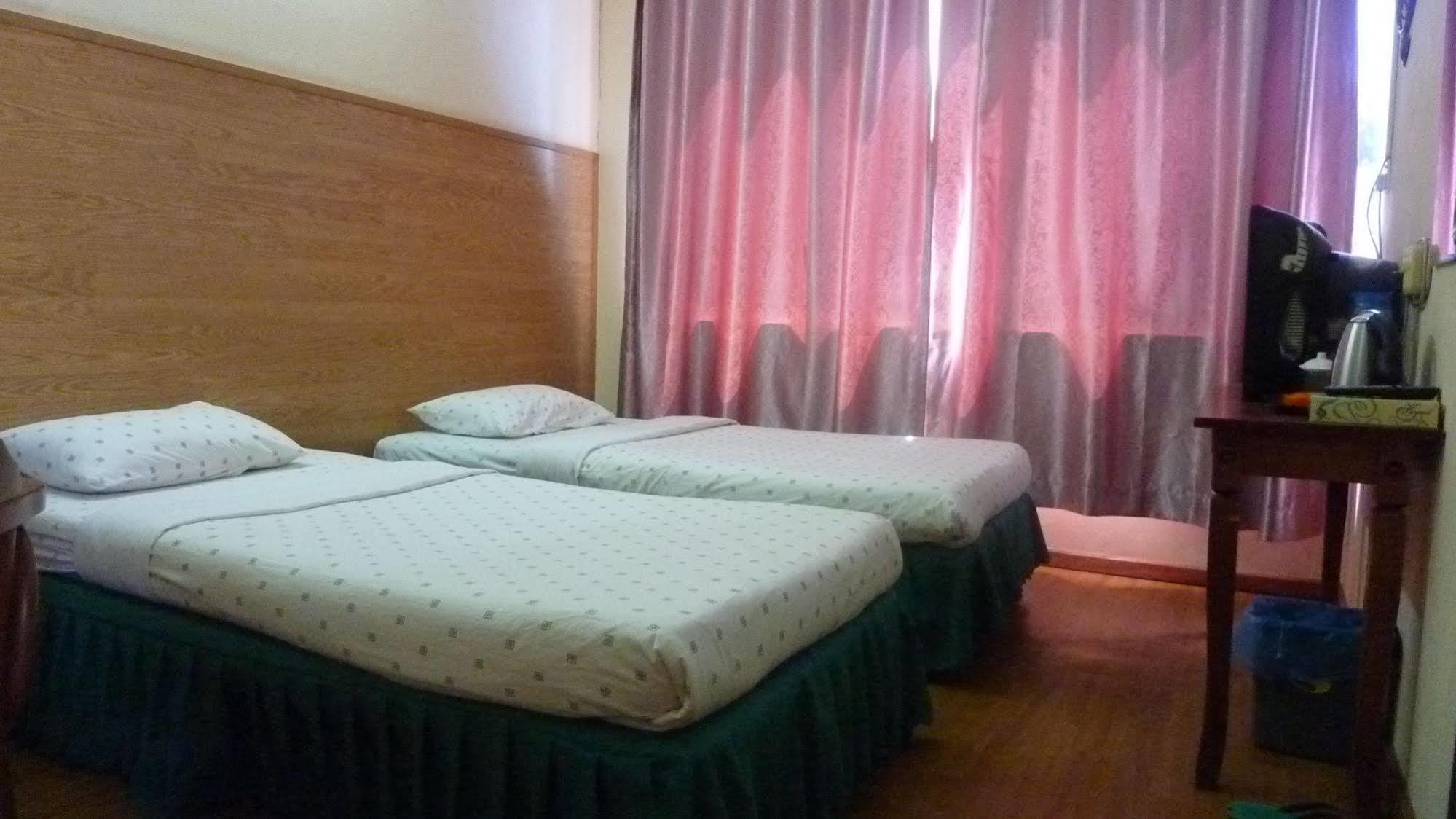 7 Hung Hung Inn Kota Kinabalu Eksteriør bilde